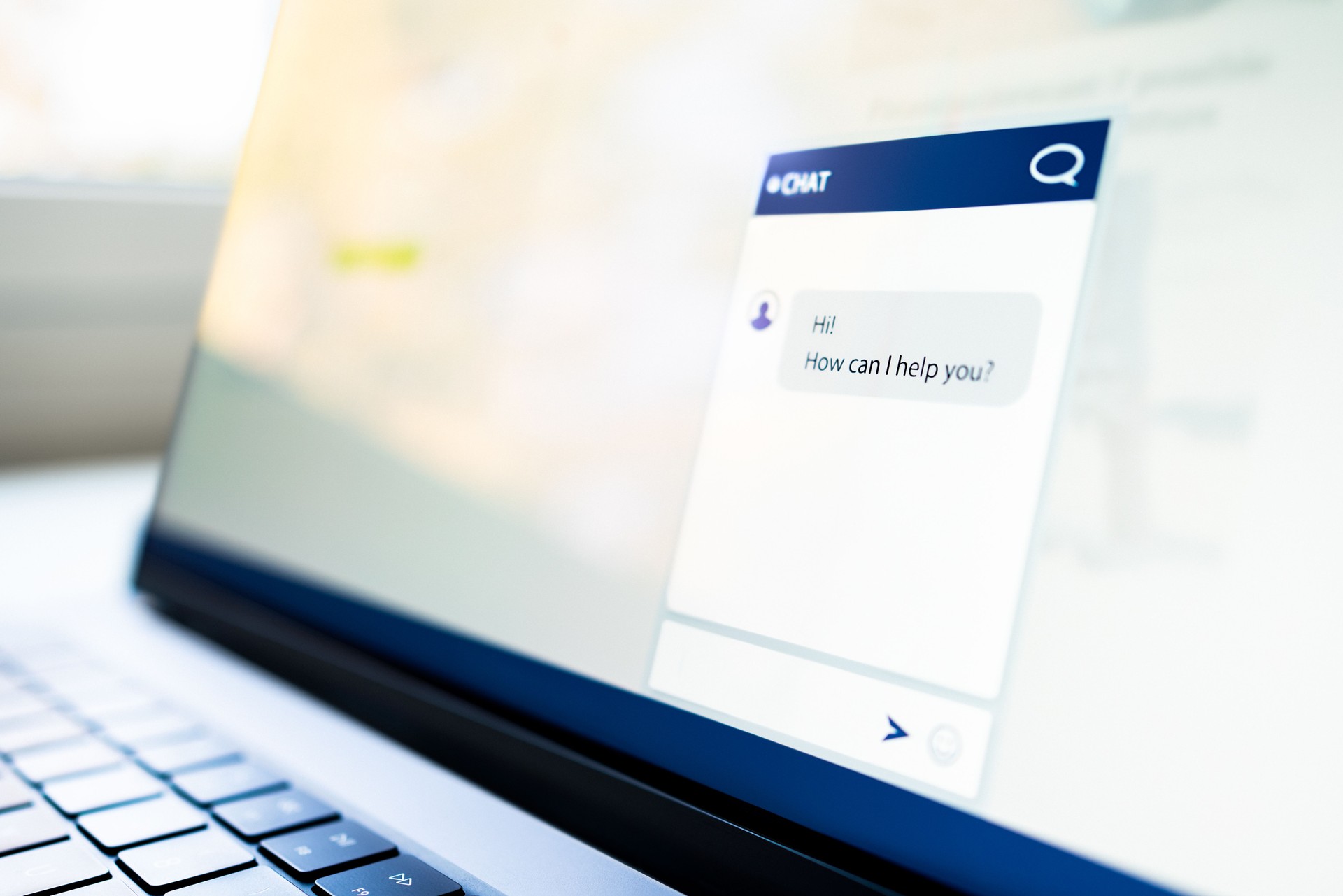 Chat with customer. AI chatbot. Support contact help center website on laptop computer screen. Live helpdesk service with bot or human. Online conversation with agent.